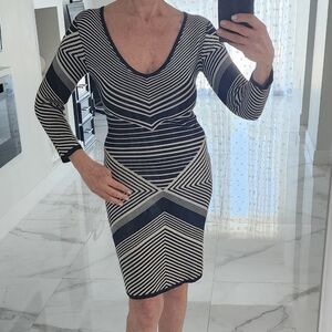 Striped V‑Neck Knit Dress in Black and White